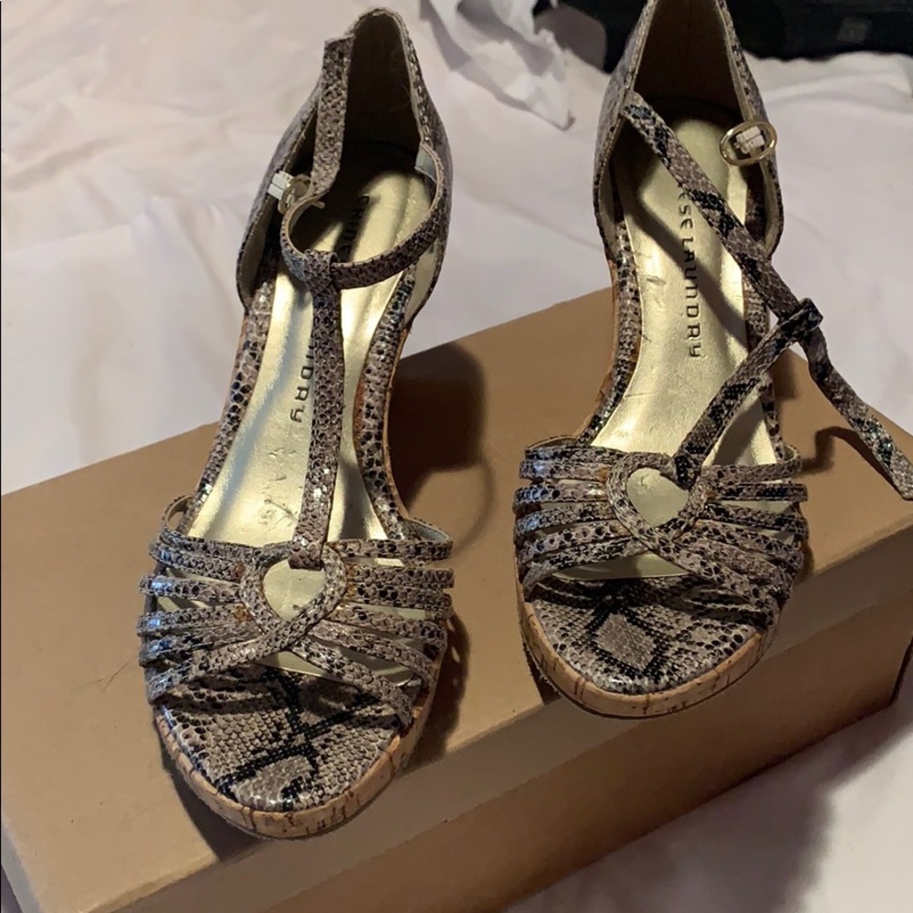 Snake skin wedge sandal.